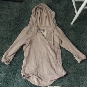 Baige hoodie with shorter sleeves.